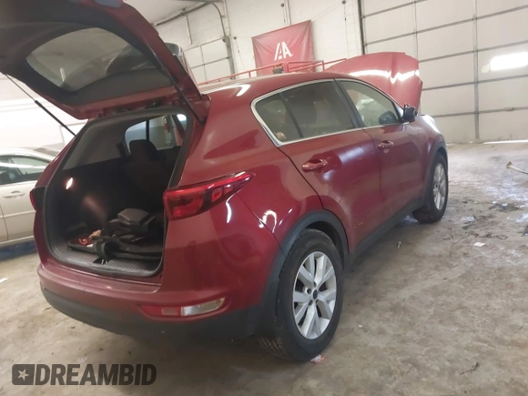2018 Kia Sportage LX with VIN KNDPM3AC4J7449705, listed as a IAAI auction lot 41640305 with 74,292 mi miles and . Bid and sale history available at carsss.com. Image 4.