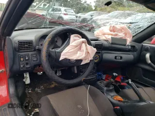 2000 Toyota MR2 z VIN JTDFR320XY0021688, wystawiony jako Copart lot #88487765 z przebiegiem 163 114 mil mil oraz Szkody całkowita. Historia ofert i sprzedaży dostępna na DreamBid. Obrazek 8.
