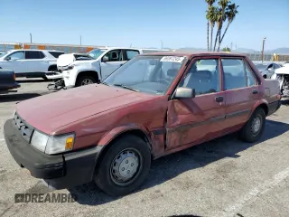 1986 Toyota Corolla with VIN JT2AE82EXG3386120, listed as a Copart auction lot 59397245 with 276,586 mi miles and Salvage title. Bid and sale history available at DreamBid. Image 1.