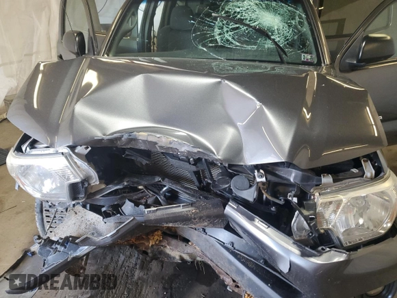 2013 Toyota Tacoma z VIN 5TFLU4ENXDX061110, wystawiony jako Copart lot #58910865 z przebiegiem Nie podano mil oraz Szkoda całkowita • Salvage title. Historia ofert i sprzedaży dostępna na DreamBid. Obrazek 11.