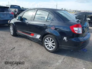 2008 Suzuki SX4 Convenience Pkg with VIN JS2YC415985102350, listed as a IAAI auction lot 41626643 with 210,929 mi miles. Bid and sale history available at carsss.com. Image 3.