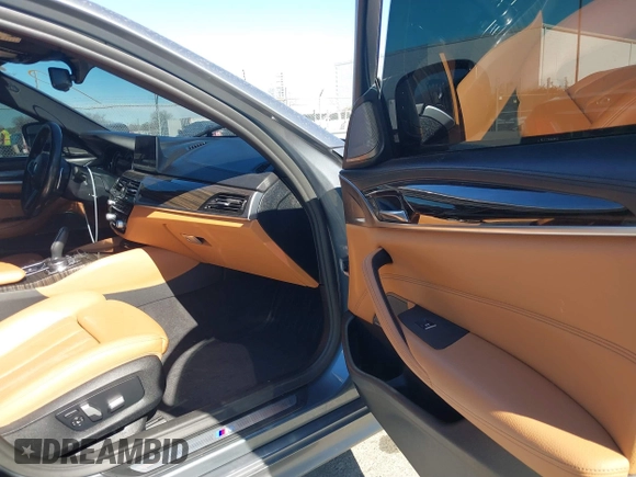 2018 BMW 5 Series 540i with VIN WBAJE5C59JWA96901, listed as a IAAI auction lot 41690919 with 67,395 mi miles and . Bid and sale history available at carsss.com. Image 5.