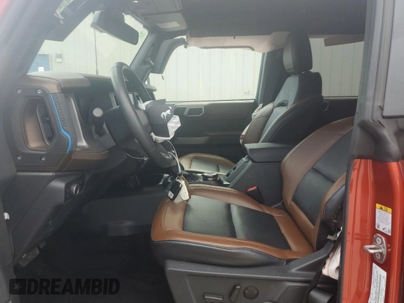 2023 Ford Bronco with VIN 1FMDE5BHXPLB99680, listed as a Copart auction lot 54232455 with 16,579 mi miles and Salvage Title. Bid and sale history available at DreamBid. Image 7.