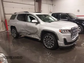 2020 GMC Acadia Denali with VIN 1GKKNXLS9LZ215459, listed as a IAAI auction lot 40815587 with 58,389 mi miles. Bid and sale history available at carsss.com. Image 1.