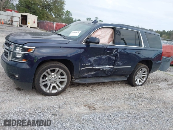 2019 Chevrolet Tahoe LT with VIN 1GNSCBKC7KR133119, listed as a IAAI auction lot 41570650 with 114,575 mi miles and . Bid and sale history available at DreamBid. Image 14.