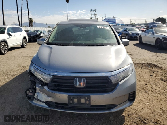 2021 Honda Odyssey EX-L with VIN 5FNRL6H77MB011099, listed as a Copart auction lot 47412535 with 148,004 mi miles and Salvage Title. Bid and sale history available at DreamBid. Image 5.