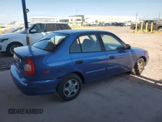 2002 Hyundai Accent GL with VIN KMHCG45C32U332833, listed as a Copart auction lot 66539644 with 69,763 mi miles and Salvage Title. Bid and sale history available at carsss.com. Image 3.