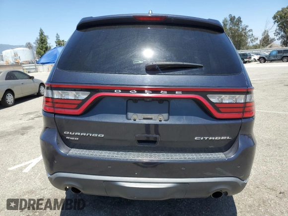 2014 Dodge Durango Citadel with VIN 1C4SDJET1EC594240, listed as a Copart auction lot 58090285 with 160,027 mi miles and Salvage title. Bid and sale history available at DreamBid. Image 6.