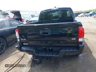 2022 Toyota Tacoma SR with VIN 3TYCZ5AN0NT074683, listed as a IAAI auction lot 42117875 with 51,112 mi miles and . Bid and sale history available at DreamBid. Image 16.