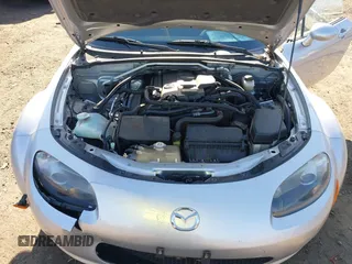2007 Mazda MX-5 Miata Sport z VIN JM1NC25F170135777, wystawiony jako IAAI lot #41746586 z przebiegiem 107 302 mil mil oraz . Historia ofert i sprzedaży dostępna na DreamBid. Obrazek 10.