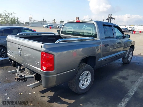 2005 Dodge Dakota SLT with VIN 1D7HE48N75S365305, listed as a IAAI auction lot 41450254 with 181,941 mi miles. Bid and sale history available at carsss.com. Image 4.
