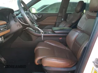 2021 Lincoln Aviator Reserve z VIN 5LM5J7WCXMGL18310, wystawiony jako Copart lot #76247904 z przebiegiem 69 111 mil mil oraz Nie do naprawy • Non repairable. Historia ofert i sprzedaży dostępna na DreamBid. Obrazek 7.