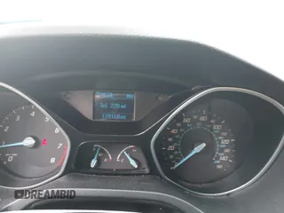 2012 Ford Focus SE z VIN 1FAHP3F2XCL430734, wystawiony jako IAAI lot #42469084 z przebiegiem 128 168 mil mil oraz . Historia ofert i sprzedaży dostępna na DreamBid. Obrazek 7.