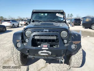 2015 Jeep Wrangler Unlimited Rubicon Hard Rock with VIN 1C4HJWFG1FL710264, listed as a Copart auction lot 47563975 with 96,737 mi miles and Salvage Title. Bid and sale history available at carsss.com. Image 5.