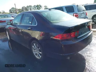 2007 Acura TSX Navi with VIN JH4CL969X7C012999, listed as a IAAI auction lot 42234186 with 205,006 mi miles and . Bid and sale history available at DreamBid. Image 3.