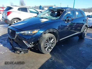 2017 Mazda CX-3 Touring with VIN JM1DKFC75H0157610, listed as a IAAI auction lot 41326591 with 51,291 mi miles. Bid and sale history available at carsss.com. Image 2.