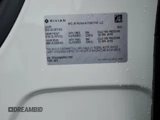 2023 Rivian R1S Adventure z VIN 7PDSGABA6PN017889, wystawiony jako Copart lot #68860864 z przebiegiem 7661 mil mil oraz Szkody całkowita. Historia ofert i sprzedaży dostępna na DreamBid. Obrazek 14.