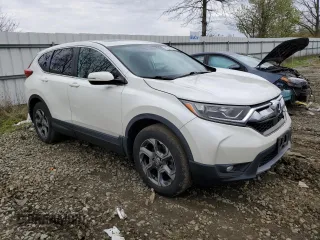 2018 Honda CR-V EX with VIN 2HKRW2H5XJH648371, listed as a Copart auction lot 52927265 with 83,127 mi miles and Salvage Title. Bid and sale history available at DreamBid. Image 4.