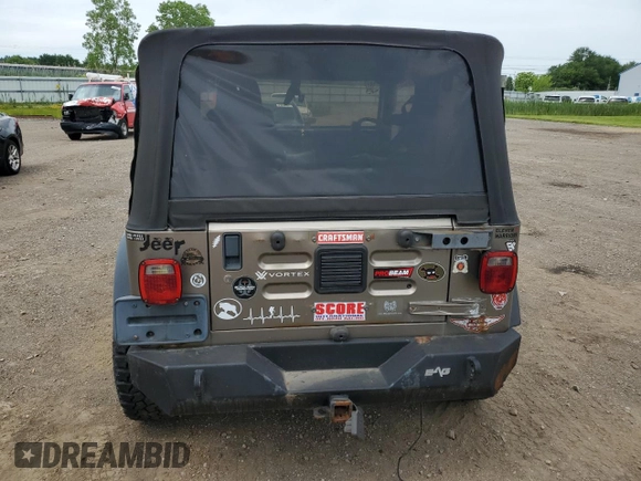 2004 Jeep Wrangler Rubicon z VIN 1J4FA69S24P713388, wystawiony jako Copart lot #61196515 z przebiegiem 155 092 mil mil oraz Czysty tytuł • Clean title. Historia ofert i sprzedaży dostępna na DreamBid. Obrazek 6.