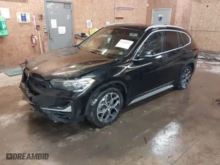 2020 BMW X1 xDrive28i with VIN WBXJG9C07L5P71792, listed as a IAAI auction lot 41583132 with 150,095 mi miles. Bid and sale history available at carsss.com. Image 2.