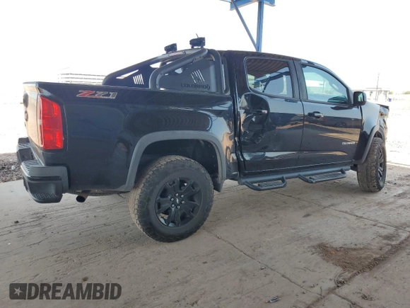 2016 Chevrolet Colorado 4WD Z71 with VIN 1GCGTDE33G1201251, listed as a Copart auction lot 64518695 with 123,602 mi miles and Salvage title. Bid and sale history available at DreamBid. Image 3.