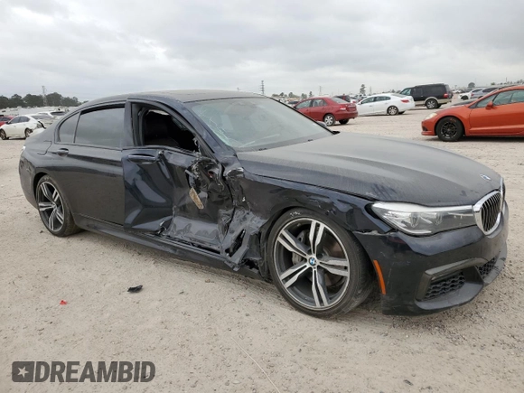 2017 BMW 7 Series 740i with VIN WBA7E2C37HG740680, listed as a Copart auction lot 45072763 with 76,828 mi miles. Bid and sale history available at carsss.com. Image 4.