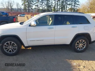 2014 Jeep Grand Cherokee Limited with VIN 1C4RJEBG9EC414265, listed as a IAAI auction lot 41843360 with 118,767 mi miles and . Bid and sale history available at DreamBid. Image 14.