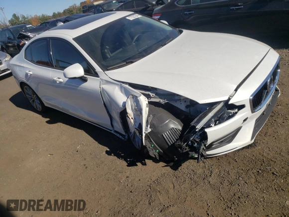 2021 Volvo S60 Momentum with VIN 7JRA22TK6MG102246, listed as a Copart auction lot 77527944 with 59,800 mi miles and Salvage Title. Bid and sale history available at carsss.com. Image 4.
