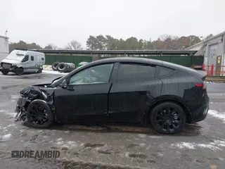 2023 Tesla Model Y Long Range with VIN 7SAYGDEE8PA183301, listed as a IAAI auction lot 41498769 with 82,893 mi miles and . Bid and sale history available at carsss.com. Image 14.