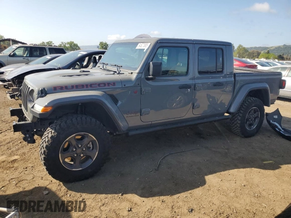 2023 Jeep Gladiator Rubicon with VIN 1C6JJTBG8PL550219, listed as a Copart auction lot 54627685 with 9,671 mi miles and Salvage title. Bid and sale history available at DreamBid. Image 1.