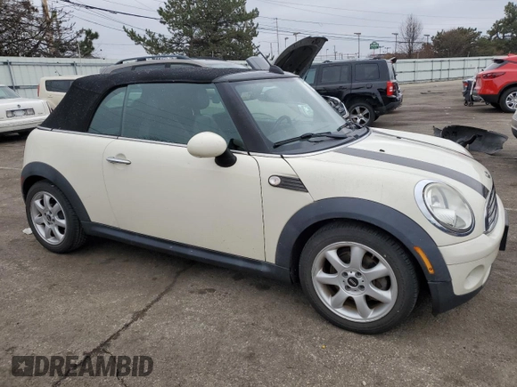 2010 MINI Convertible with VIN WMWMR3C56ATZ19689, listed as a Copart auction lot 45427705 with 134,319 mi miles and Clean Title. Bid and sale history available at DreamBid. Image 4.