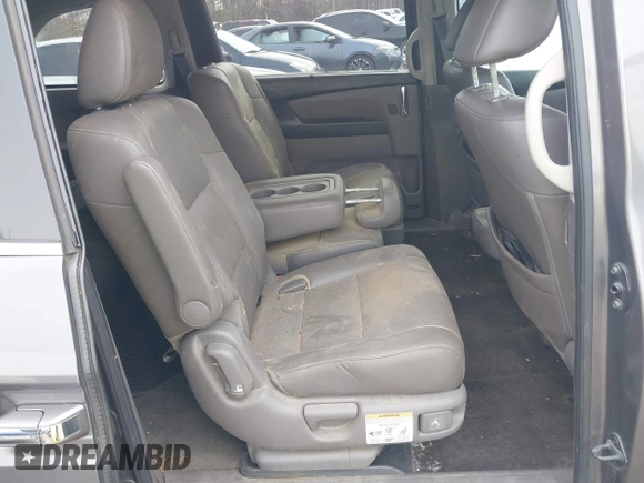 2014 Honda Odyssey Touring with VIN 5FNRL5H94EB020257, listed as a IAAI auction lot 41924245 with 204,526 mi miles and . Bid and sale history available at DreamBid. Image 8.