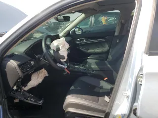 2023 Honda Civic Touring z VIN 2HGFE1F94PH310134, wystawiony jako Copart lot #52311085 z przebiegiem 32 682 mil mil oraz Szkoda całkowita • Salvage title. Historia ofert i sprzedaży dostępna na DreamBid. Obrazek 7.