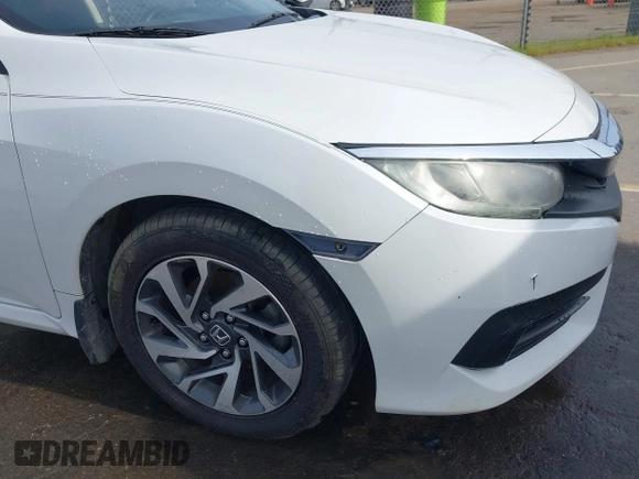 2016 Honda Civic EX with VIN 19XFC2F72GE097060, listed as a IAAI auction lot 41626940 with 156,941 mi miles and . Bid and sale history available at DreamBid. Image 20.