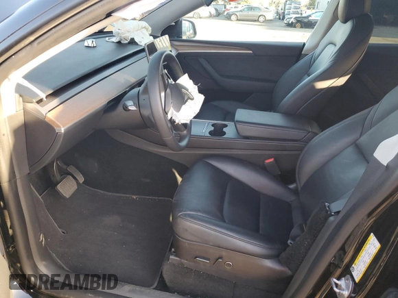 2022 Tesla Model Y Long Range with VIN 7SAYGAEE1NF562042, listed as a Copart auction lot 45702845 with 34,240 mi miles and Salvage Title. Bid and sale history available at carsss.com. Image 7.