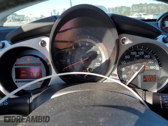 2014 Nissan 370Z Touring with VIN JN1AZ4FH3EM620195, listed as a Copart auction lot 83207104 with 66,974 mi miles and Salvage Title. Bid and sale history available at DreamBid. Image 9.
