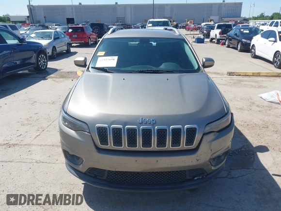 2019 Jeep Cherokee Latitude Plus with VIN 1C4PJMLBXKD233749, listed as a IAAI auction lot 41937698 with 103,988 mi miles and . Bid and sale history available at DreamBid. Image 13.