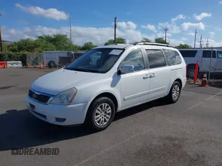 2011 Kia Sedona LX with VIN KNDMG4C77B6376157, listed as a IAAI auction lot 41787592 with 126,932 mi miles. Bid and sale history available at carsss.com. Image 2.