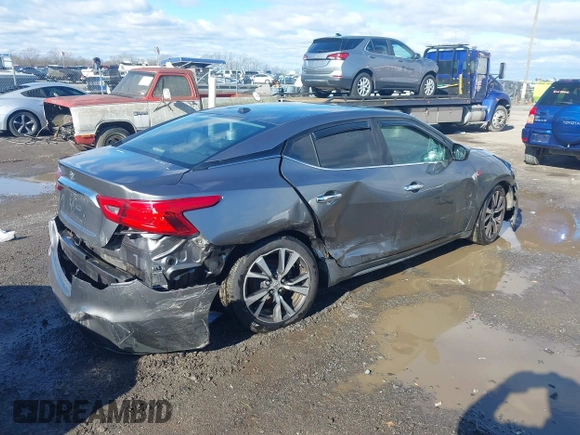 2016 Nissan Maxima Platinum with VIN 1N4AA6AP7GC409949, listed as a IAAI auction lot 41214746 with 190,853 mi miles and . Bid and sale history available at DreamBid. Image 4.