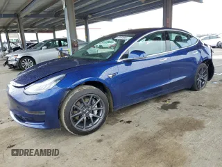 2020 Tesla Model 3 Standard Range Plus with VIN 5YJ3E1EA1LF631139, listed as a Copart auction lot 49161805 with 58,140 mi miles and Salvage Title. Bid and sale history available at DreamBid. Image 1.