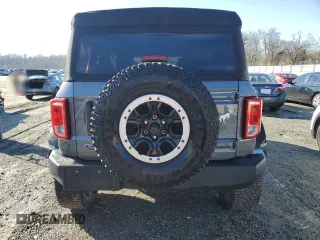 2021 Ford Bronco with VIN 1FMEE5DP9MLA89837, listed as a Copart auction lot 87672995 with 27,341 mi miles and Salvage Title. Bid and sale history available at DreamBid. Image 6.