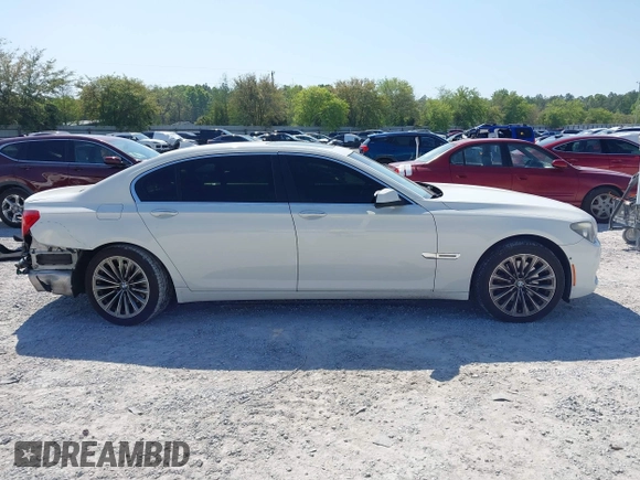 2012 BMW 7 Series 740Li with VIN WBAKB4C53CC576991, listed as a IAAI auction lot 41985643 with 107,416 mi miles and . Bid and sale history available at DreamBid. Image 14.
