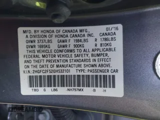 2016 Honda Civic Sedan LX with VIN 2HGFC2F52GH532101, listed as a IAAI auction lot 42009854 with 67,148 mi miles. Bid and sale history available at carsss.com. Image 9.