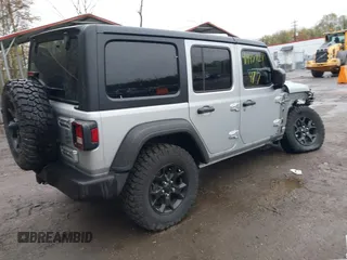 2022 Jeep Wrangler Unlimited Willys Sport with VIN 1C4HJXDM9NW272685, listed as a IAAI auction lot 41948921 with Not provided miles and . Bid and sale history available at DreamBid. Image 4.