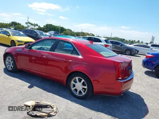 2009 Cadillac CTS RWD w/1SA with VIN 1G6DF577290142964, listed as a IAAI auction lot 42017475 with 171,696 mi miles. Bid and sale history available at carsss.com. Image 3.
