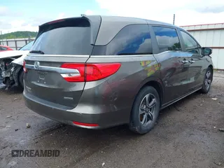 2019 Honda Odyssey Touring with VIN 5FNRL6H81KB038790, listed as a IAAI auction lot 42200190 with 131,761 mi miles and . Bid and sale history available at DreamBid. Image 4.
