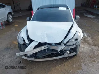 2021 Tesla Model 3 Long Range with VIN 5YJ3E1EB6MF094309, listed as a IAAI auction lot 41651475 with Not Provided miles. Bid and sale history available at carsss.com. Image 6.