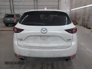 2017 Mazda CX-5 Touring with VIN JM3KFBCL9H0107589, listed as a IAAI auction lot 41241481 with 77,032 mi miles. Bid and sale history available at carsss.com. Image 16.