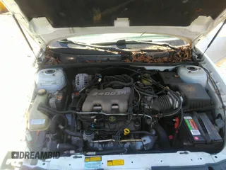 2000 Oldsmobile Alero GL2 z VIN 1G3NL52E4YC403539, wystawiony jako IAAI lot #42313033 z przebiegiem Nie podano mil oraz . Historia ofert i sprzedaży dostępna na DreamBid. Obrazek 10.
