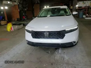 2023 Honda Accord Touring z VIN 1HGCY2F86PA036487, wystawiony jako Copart lot #59908465 z przebiegiem 21 597 mil mil oraz Szkoda całkowita • Salvage title. Historia ofert i sprzedaży dostępna na DreamBid. Obrazek 13.